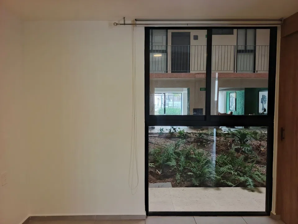 Foto 9 de Departamento en Venta en Condominio Altura Guadalajara | Planta Baja con Jardín y Amenidades