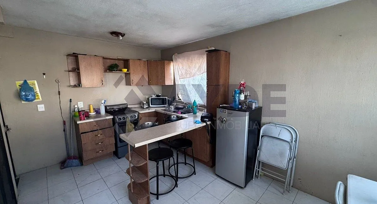 Foto 5 de CASA EN VENTA CON LOCALES COMERCIALES EN AURELIO GONZÁLEZ 1971