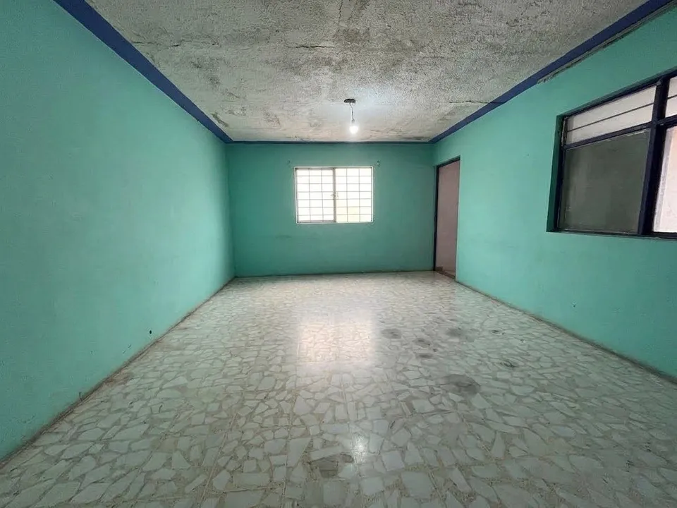 Foto 5 de PROPIEDAD CON 2 CASAS DUPLEX Y 1 SALON USOS MULTIPLES (COMERCIAL O HABITACIONAL)